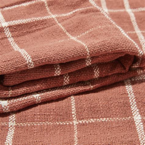 - Its 100 cotton and machine washable, so you can spend more time relaxing comfortably - The timeless design is perfect for fall, yet versatile enough. . Little korboose woven throw blanket in rust